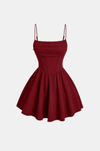 Ruched mini dress with spaghetti straps and flared skirt, burgundy