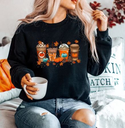 Women’s black crewneck sweatshirt with fall-themed graphic and long sleeves