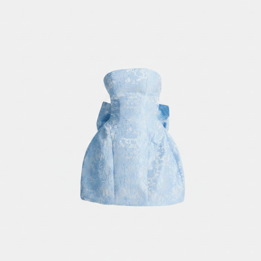 Light blue strapless mini dress with floral jacquard fabric and bow-tied waist