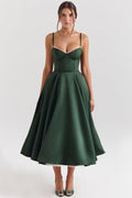 Green corset-style sleeveless midi dress with sweetheart neckline and pleated flared skirt