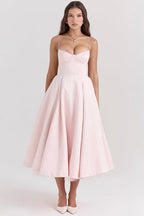 Pink corset-style sleeveless midi dress with sweetheart neckline and gathered full skirt