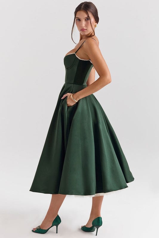 Green corset-style sleeveless midi dress with structured bodice and gathered flared skirt.