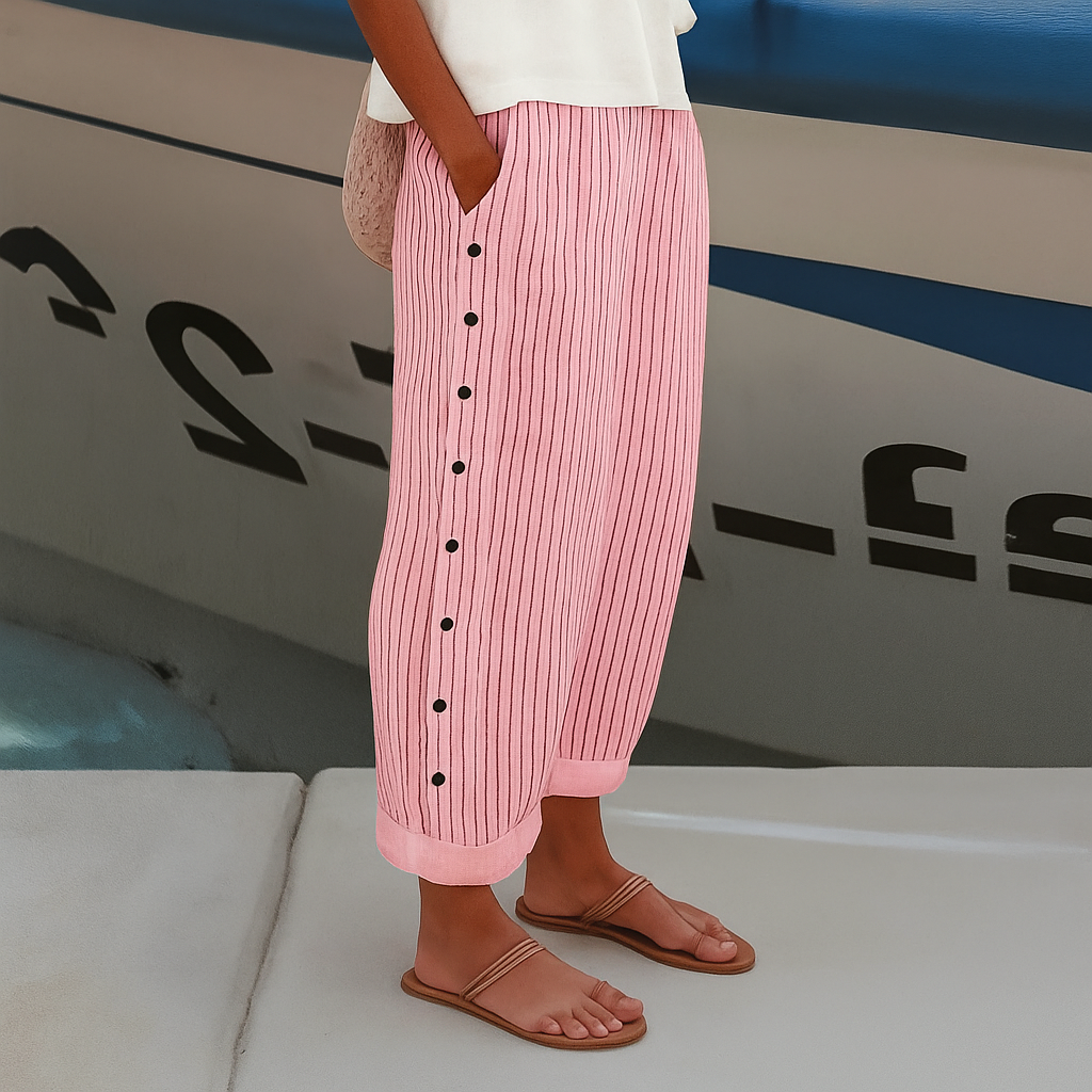 Pink wide-leg pants with vertical stripes and front button detail