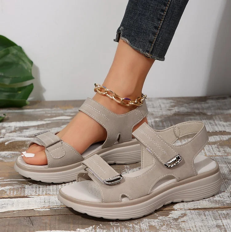 Women’s beige sandals with adjustable straps and open toe, chunky white sole