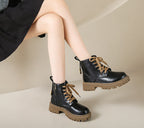 Women’s black lace-up ankle boots with side zipper, round toe, chunky lug sole