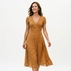 Gold A-line midi dress with V-neck and short puff sleeves, textured print.
