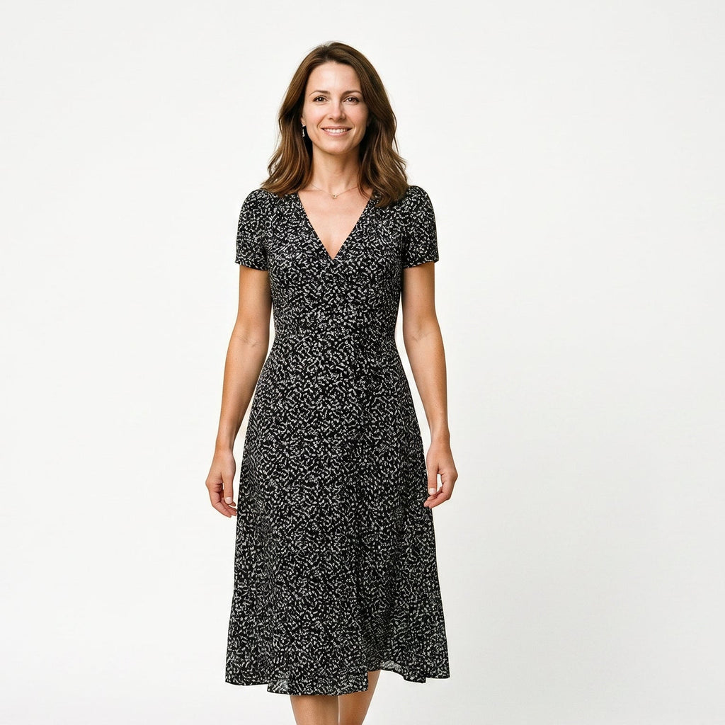 Black printed A-line midi dress with V-neck and short sleeves