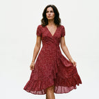 Bordeaux red A-line midi dress with V-neck and short puff sleeves, textured print.