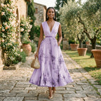 Lavender maxi dress with V-neck bodice, sleeveless look, gathered waist, floral wash