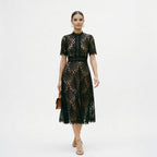 Black lace midi dress with short sleeves and fitted waist detail