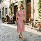 Pink lace midi dress with short sleeves and fitted waistband detail