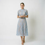 Light blue lace midi dress with short sleeves, round neckline, and scalloped hem