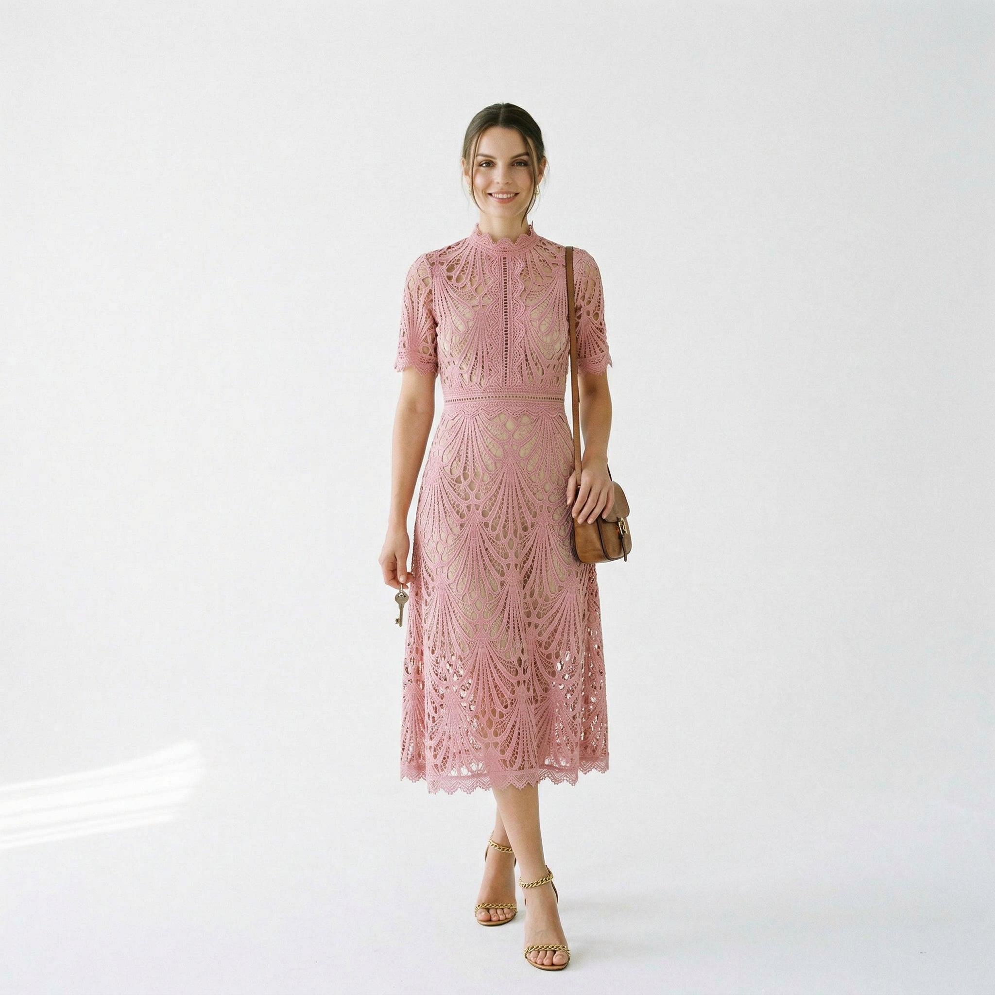 Pink lace midi dress with short sleeves and textured floral lace design