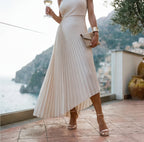 White one-shoulder pleated maxi dress with handkerchief hem