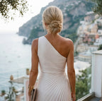 White one-shoulder pleated maxi dress, open-back style