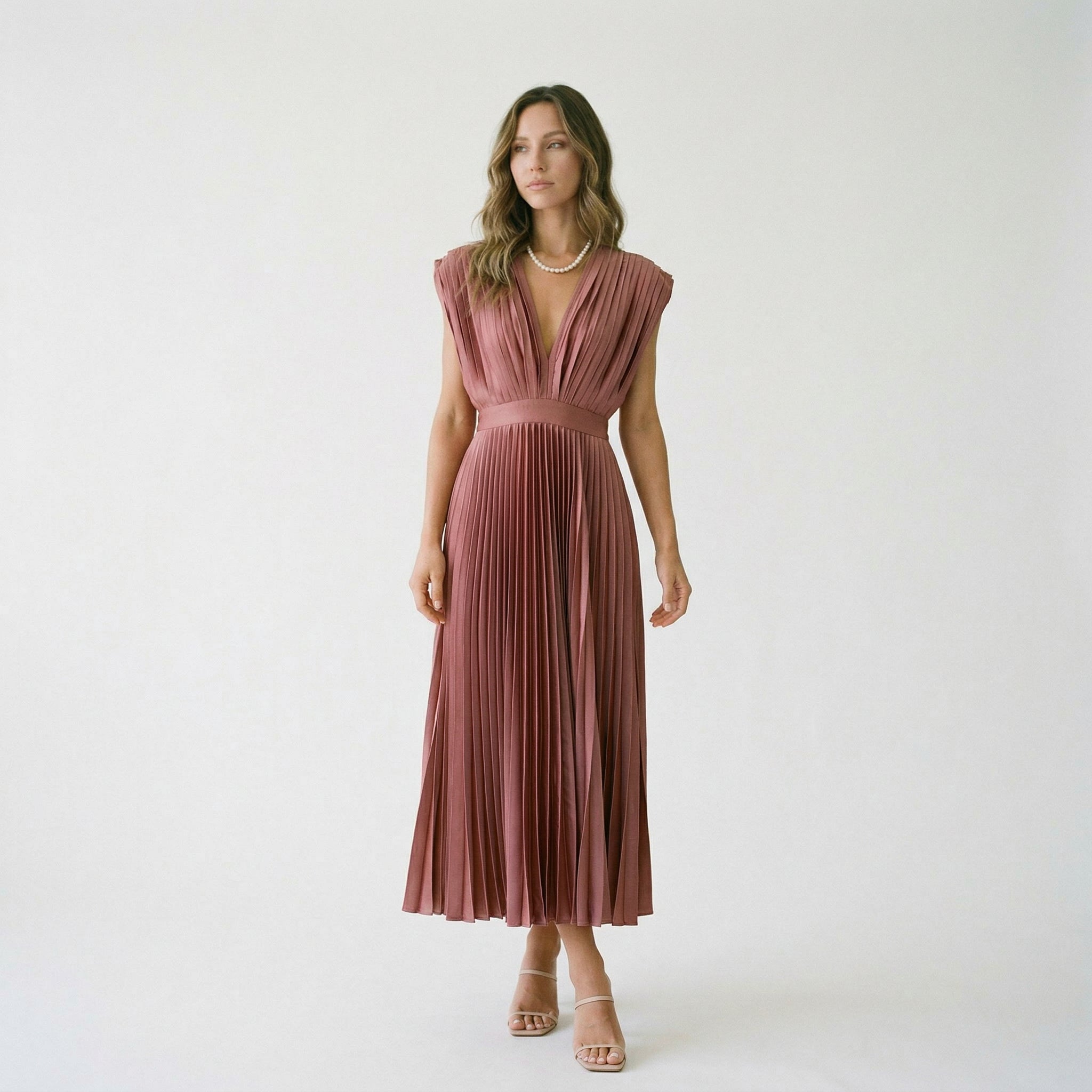 Antique pink pleated V-neck midi dress with short sleeves and gathered waist detail