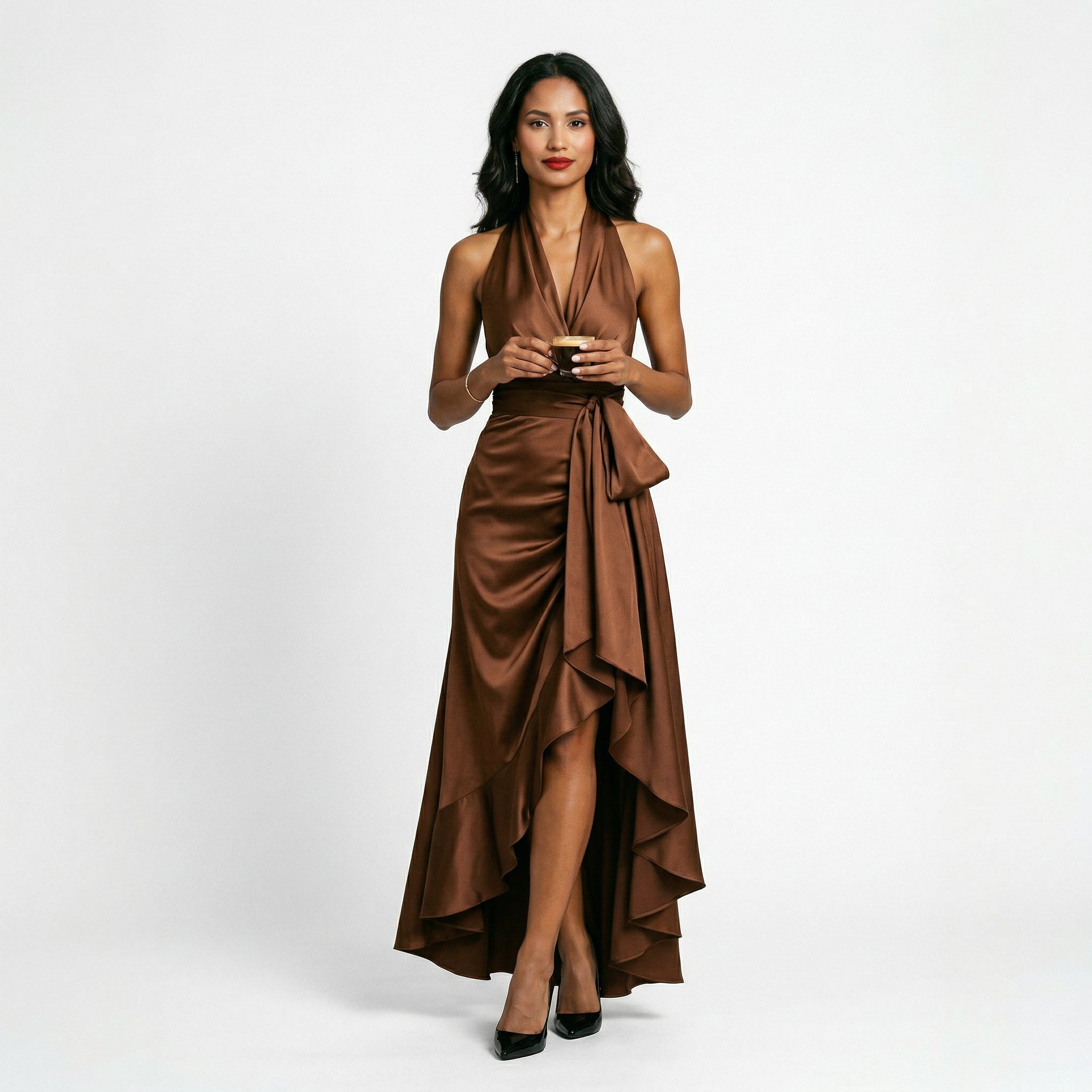 Brown satin halter gown with draped twist front, tie detail, and high slit