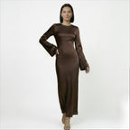 Brown long-sleeve maxi dress with tie waist, straight fitted skirt