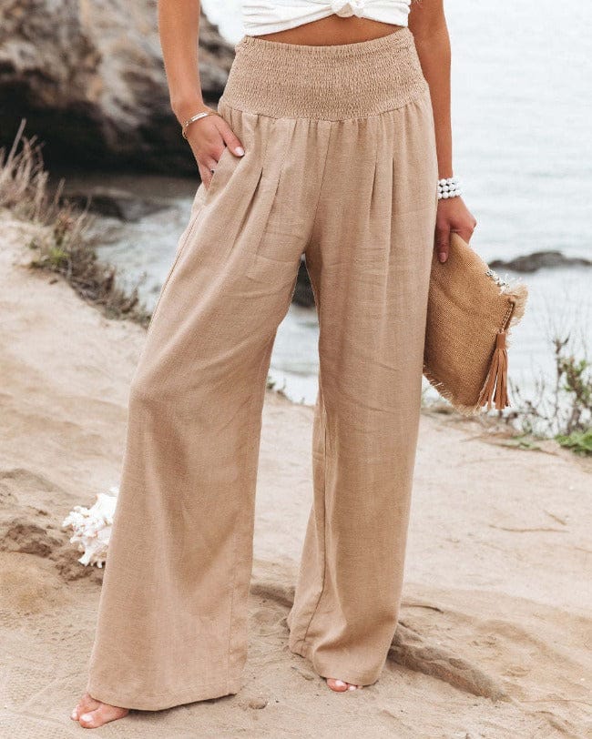 Beige high-waisted linen wide-leg trousers with elastic smocked waistband