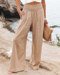 Beige high-waisted linen wide-leg trousers with elastic smocked waistband