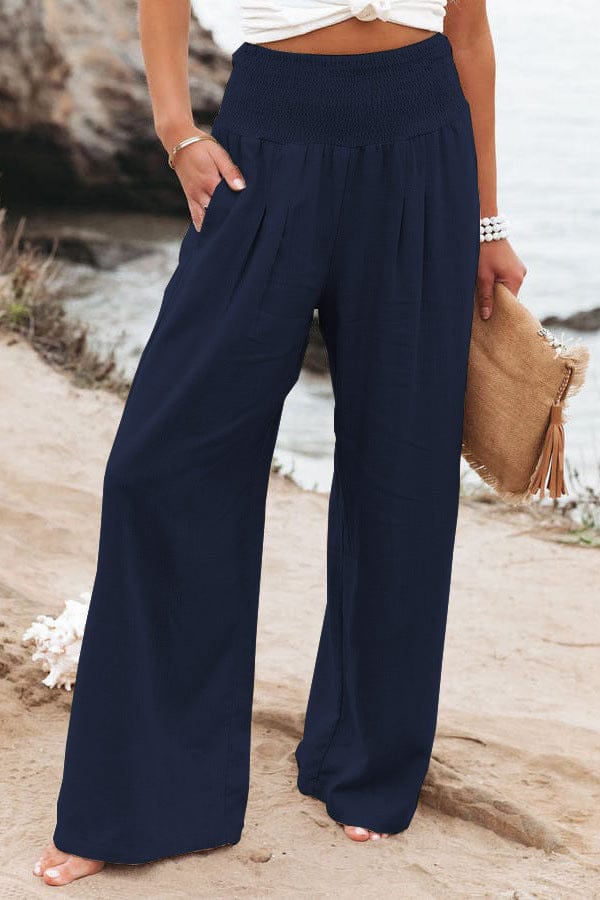 Navy high-waisted linen wide-leg trousers with elastic smocked waistband