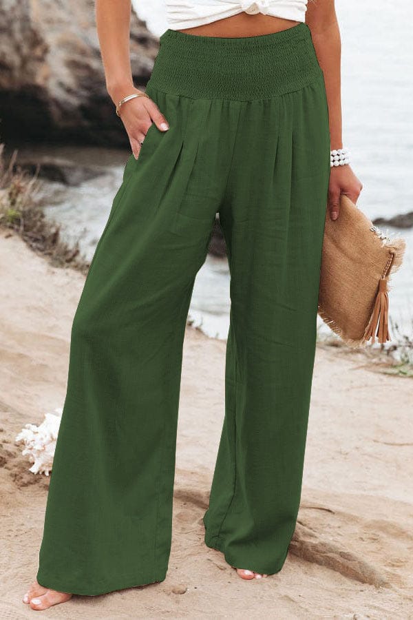 Green high-waisted linen wide-leg trousers with elastic smocked waistband