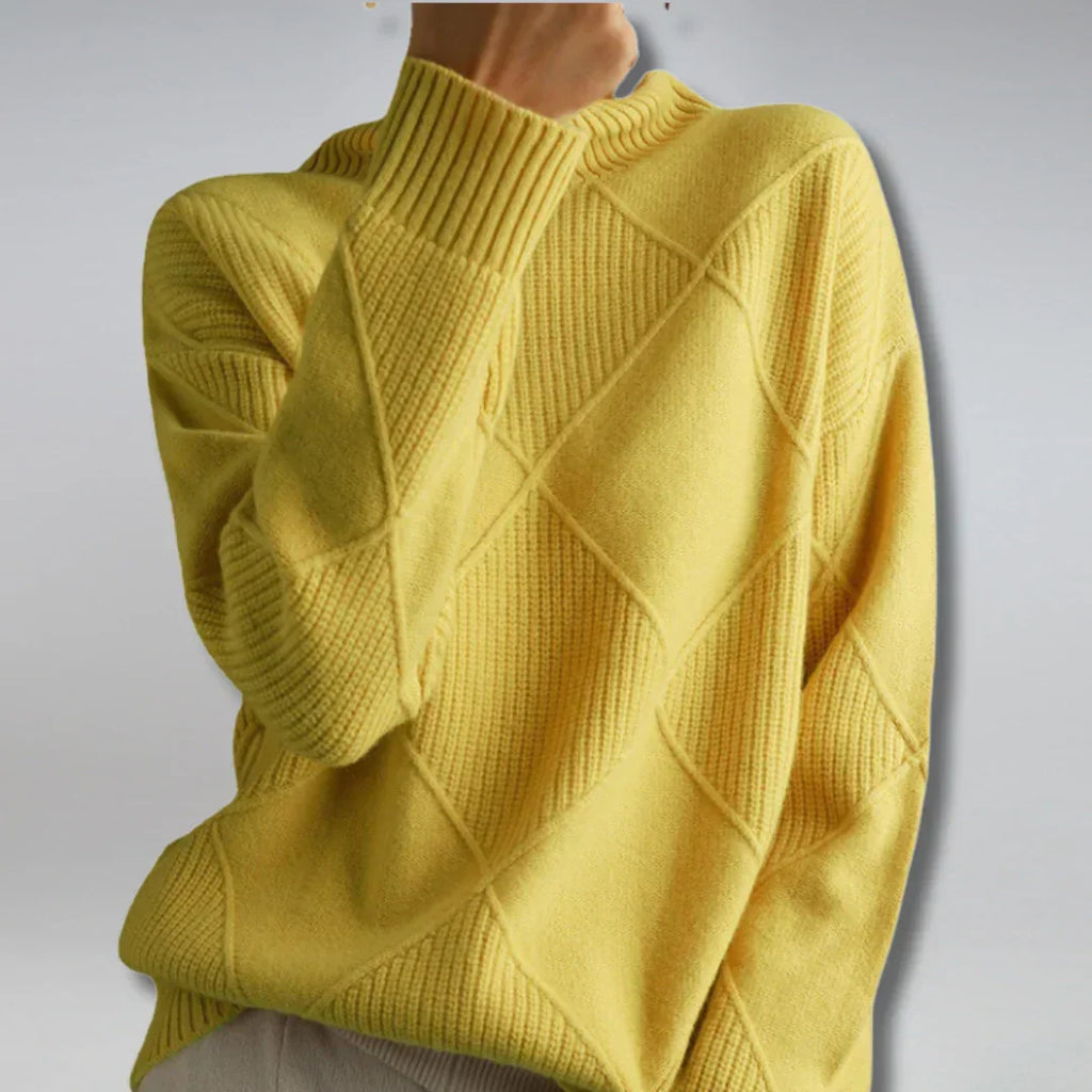 Women’s cashmere turtleneck sweater in yellow with ribbed collar and diamond knit design.