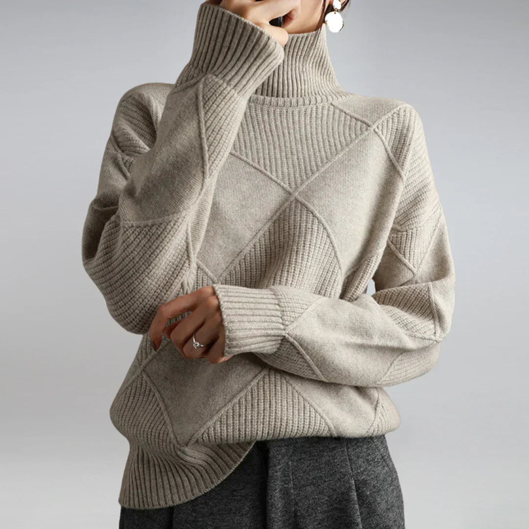Women’s cashmere turtleneck sweater in light gray, ribbed collar with diamond knit detail.