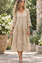 Khaki midi dress with embroidered floral pattern and lace-trim bell sleeves