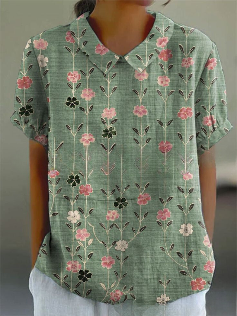 Floral print short-sleeve blouse in muted green with pink and dark floral sprigs