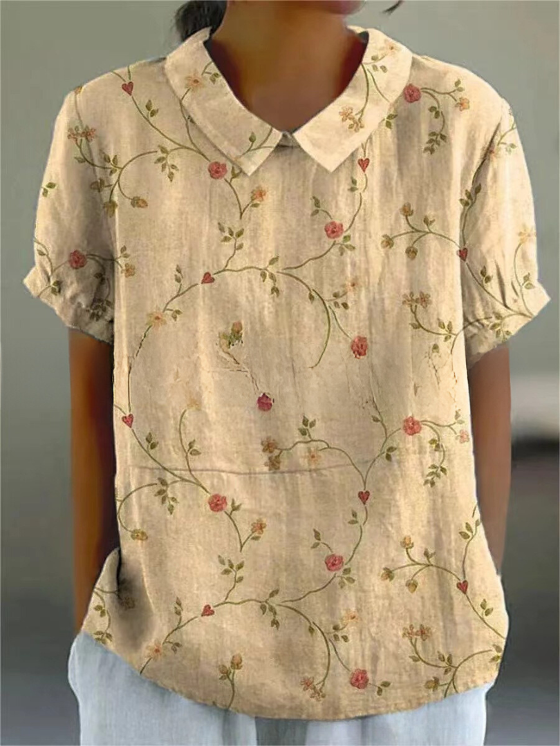 Floral print short-sleeve blouse in light beige with small red floral vines