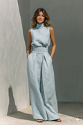 Light blue sleeveless top and wide-leg trousers set, draped waist tie