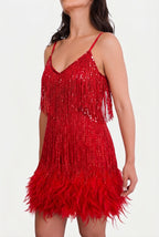 Red sequin fringe mini dress with feather hem, spaghetti straps and V-neck