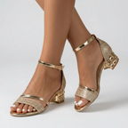 Open-toe sandals with rose-gold metallic straps, rose glitter toe strap, and block heels