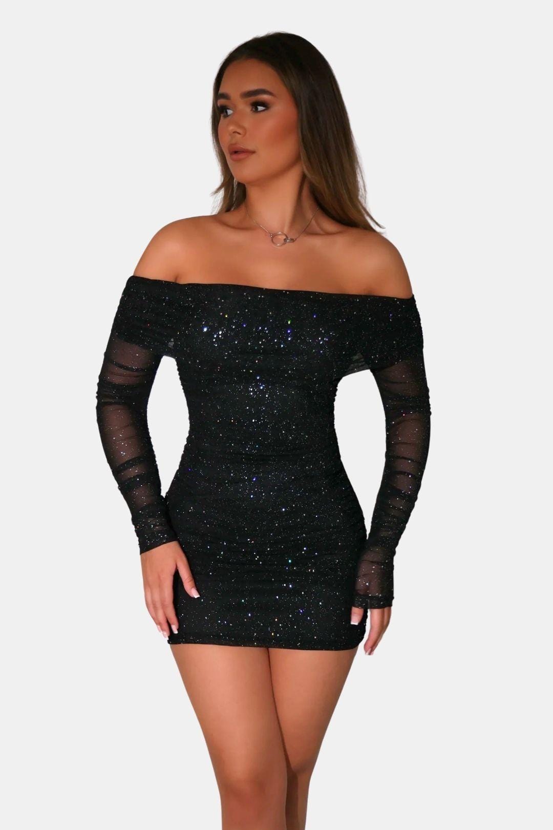 Black off-shoulder sequin mini dress with long sheer sleeves, fitted ruched front