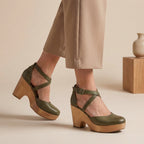 Green closed-toe platform wedge sandals with ankle strap and crisscross straps
