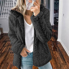 Black hooded teddy fleece vest with long sleeves and front drape