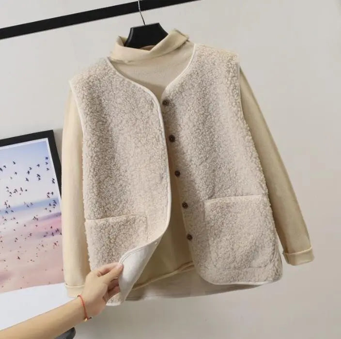 Light cream sherpa fleece vest with button front and patch pockets