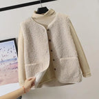 Light cream sherpa fleece vest with button front and patch pockets