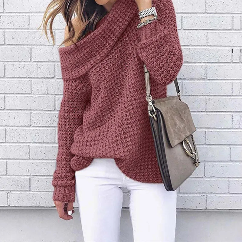 Women’s off-shoulder knitted sweater, dark pink, long sleeves with textured knit look.