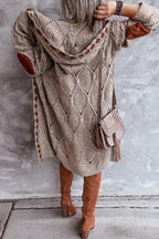 Long hooded knit cardigan with cutout trim, beige textured knit with tassel sleeves