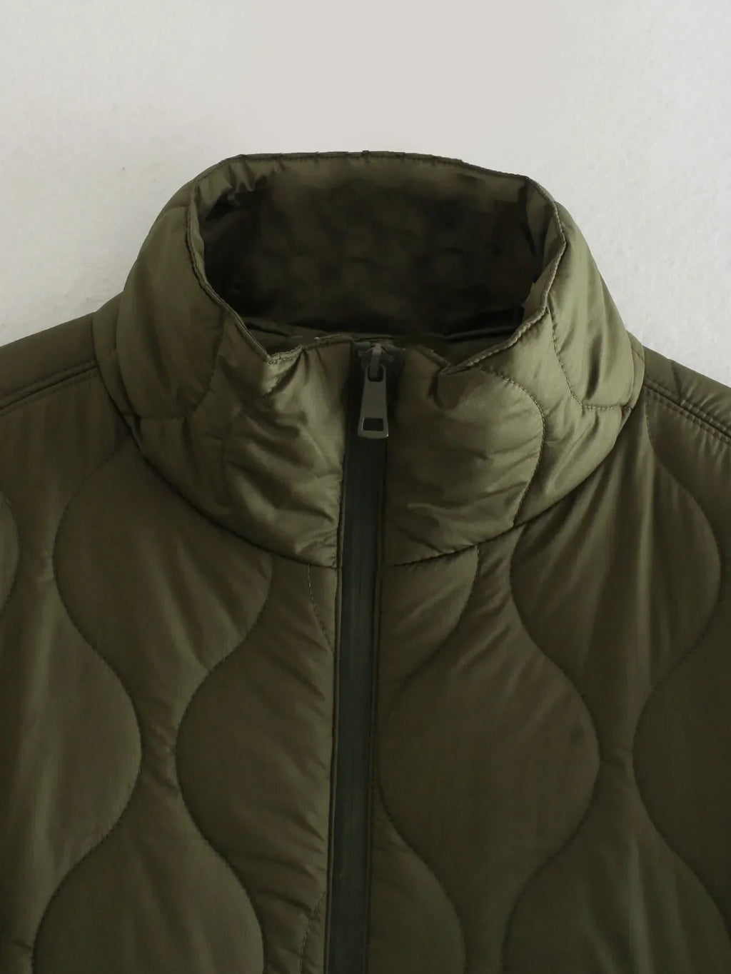 Olive green bodywarmer stand collar with center front zip closure