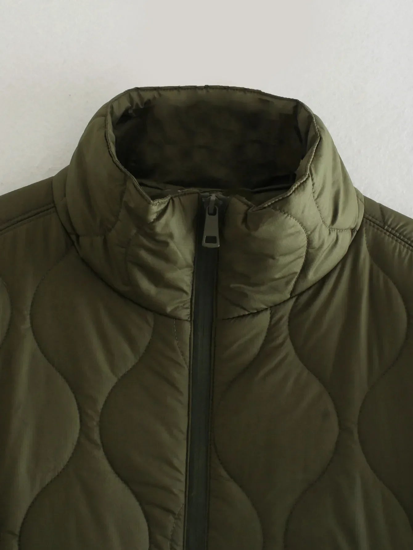Olive green bodywarmer stand collar with center front zip closure