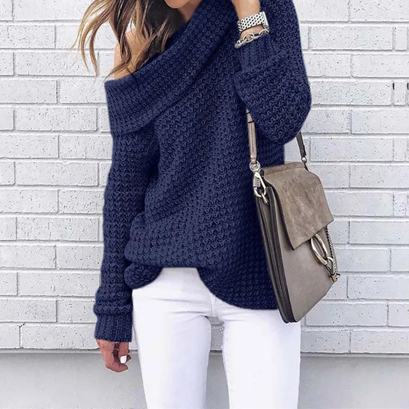 Women’s off-shoulder knitted sweater, dark blue, long sleeves with chunky knit texture.