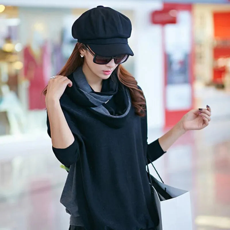 Black retro balloon hat with rounded crown and curved brim