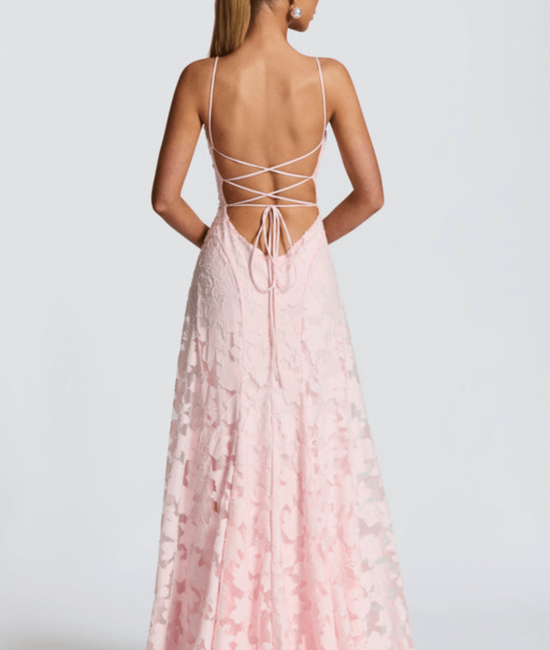 Pink maxi dress back with crisscross spaghetti straps and center tie