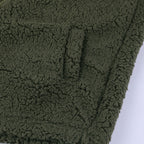 Olive green teddy fleece outerwear, textured sherpa fabric close-up