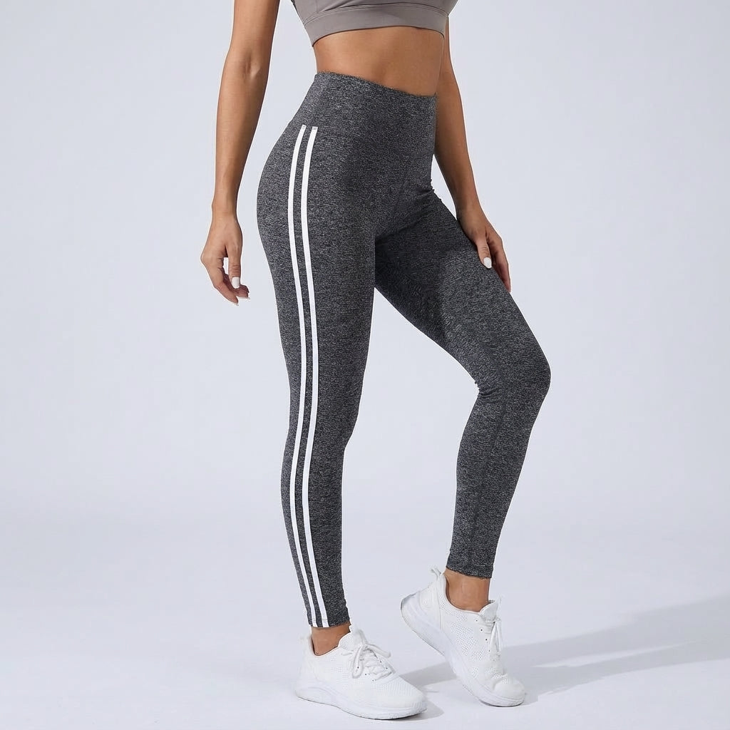 High-waisted dark gray workout leggings with three white side stripe lines.