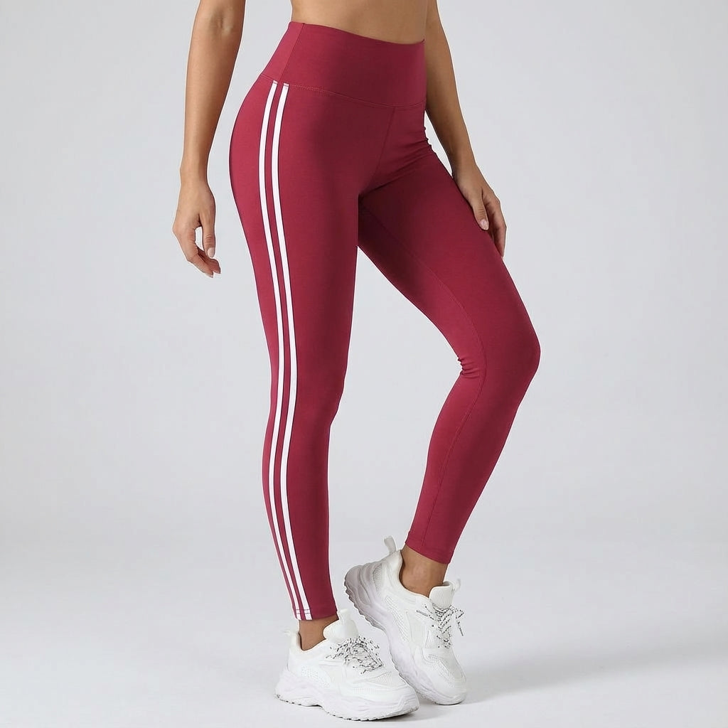 High-waisted bordeaux red workout leggings with three white side stripe lines.