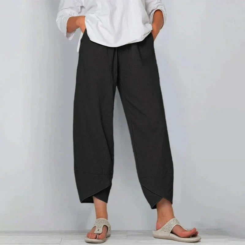 Women's wide-leg cropped pants, black, elastic waistband with angled hem detail
